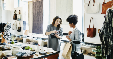 Owner processing credit card with digital tablet-907