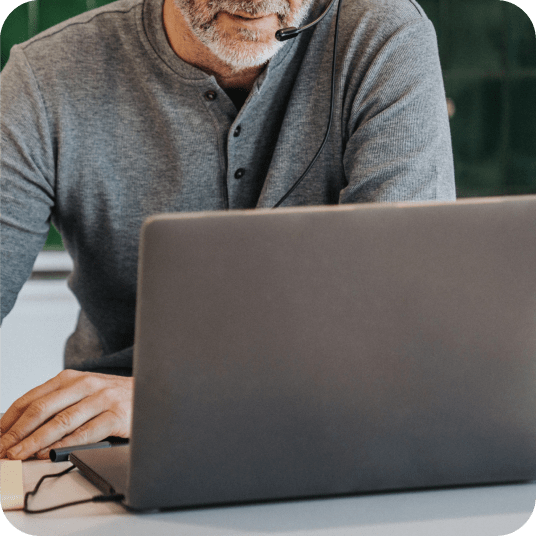 A man working using RingCentral on his laptop