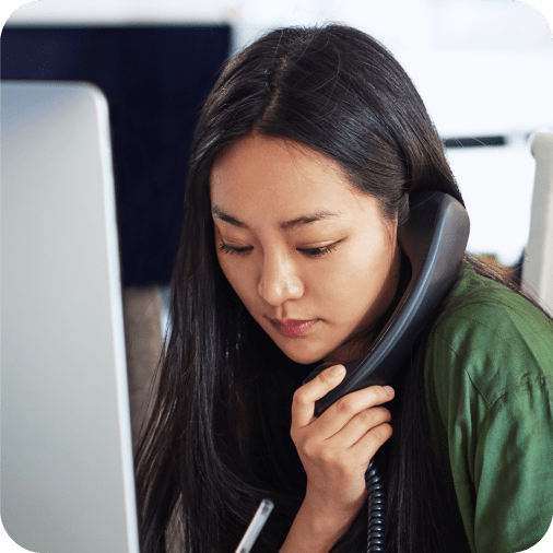 A female employee taking a call