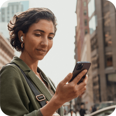 A lady looking at her mobile phone