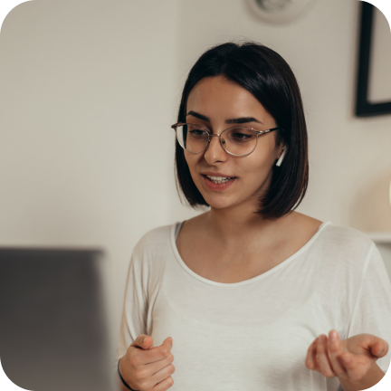 A woman participating in a webinar via RingCentral on her laptop